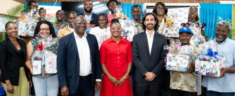 Project Manager, Food and Agriculture Organization of the United Nations (FAO), Vanessa Oates (left); Executive Director, Bureau of Standards Jamaica (BSJ), Dr. Velton Gooden (third left); Project Focal Point, BSJ, Tafara Smith (centre); and Project Donor Representative from the Standards and Trade Development Facility (STDF), Pablo Jenkins, with hot pepper farmers holding packages of farming equipment and other implements during the ‘Improving Phytosanitary, Food Safety and Market Access Opportunities along the Hot Pepper Value Chain in Jamaica’ project handover ceremony, on Monday (April 28), at the Kingston offices of the BSJ.