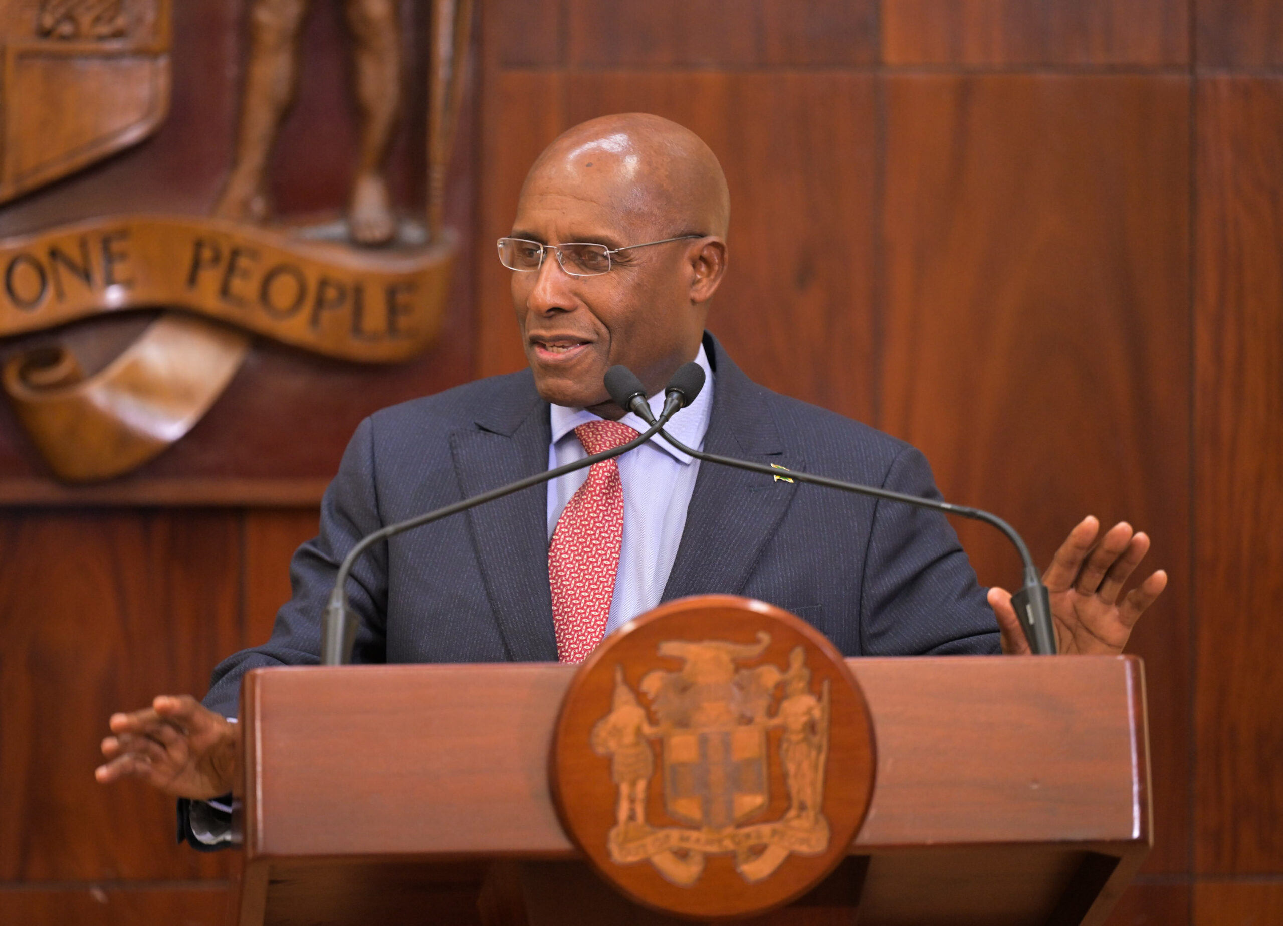 Photo of Aubyn Hill speaking