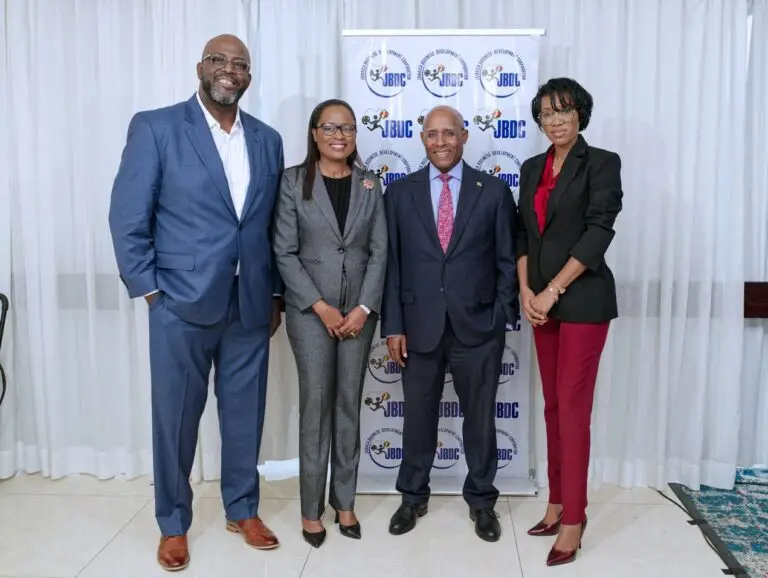 From left: JBDC Acting CEO Harold Davis shares in a photo with Sophia Henry, permanent secretary of the Ministry of Commerce in Castries, St. Lucia; Minister of Industry, Investment & Commerce Aubyn Hill; and Nadatlie Bastien-Mathurin, project manager of the Performance Management & Delivery Unit in the Office of the Prime Minister in Castries, St Lucia