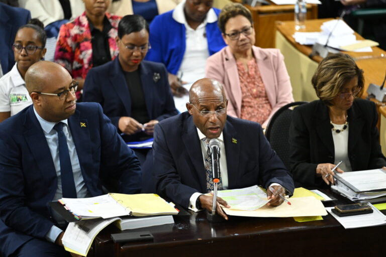Minister of Industry, Investment and Commerce Senator Aubyn Hill (centre), responds to questions during the Standing Finance Committee of the House of Representatives meeting on March 6 at Gordon House, as members reviewed the 2026/27 Estimates of Expenditure. Also pictured are State Minister Delano Seiveright and Permanent Secretary Sancia Bennett Templer (right, front row), along with other representatives of the ministry and portfolio agencies. (Photo: JIS/Adrian Walker)