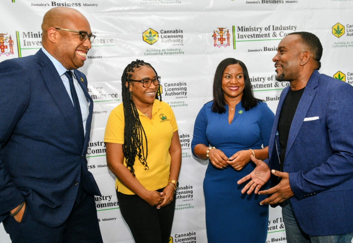 Minister of State in the Ministry of Industry, Investment and Commerce, Hon. Delano Seiveright (left), shares a light moment with (from second left) Authorisation Holder, Kimberly Myrie; Chief Executive Officer, Cannabis Licensing Authority (CLA), Farrah Blake; and President, Ganja Growers and Producers Association of Jamaica, Maurice Ellis, during the recent launch of the CLA's Medical Cannabis Special Permit Programme at the AC Hotel by Marriott Kingston.