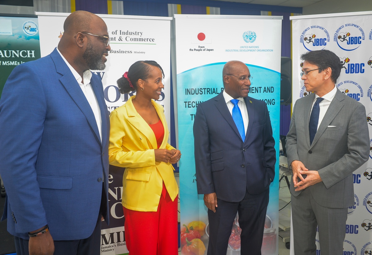 Minister of Industry, Investment and Commerce, Senator the Hon. Aubyn Hill (second right), converses with (from left) Acting Chief Executive Officer of the Jamaica Business Development Corporation (JBDC), Harold Davis; United Nations Industrial Development Organisation (UNIDO) National Project Coordinator, Sanatty Holness-Plummer, and Ambassador of Japan to Jamaica, His Excellency Kohei Maruyama. The occasion was the Call for Applications Launch for the Industrial Development and Technology Transfer among the Member States of the Caribbean Community (CARICOM) project, held on Thursday (April 16) at the JBDC Incubator and Resource Centre (IRC) in Kingston.