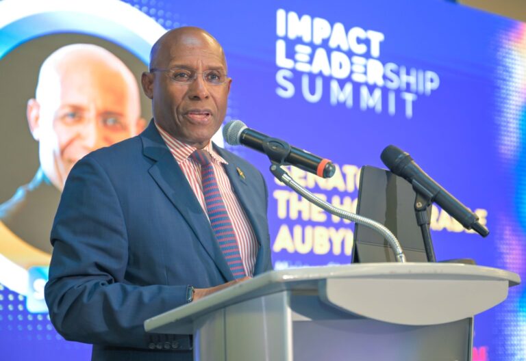 Minister of Industry, Investment and Commerce, Senator the Hon. Aubyn Hill, delivers the keynote address during the Impact Leadership Summit National CEO Strategy Forum, held at AC Hotel by Marriott Kingston on Tuesday (May 5).