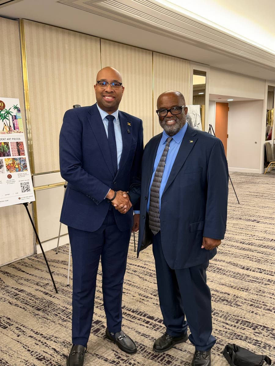 Delano Seiveright, Jamaica’s minister of state in the Ministry of Industry, Investment and Commerce, and Dr Andy Ingraham, founder, president and chief executive officer of the National Association of Black Hotel Owners, Operators and Developers, during the Marriott International Luncheon at the 30th Annual International African American Hotel Ownership and Investment Summit and Trade Show, held at the Hyatt Regency Miami in Downtown Miami, Florida on Friday.