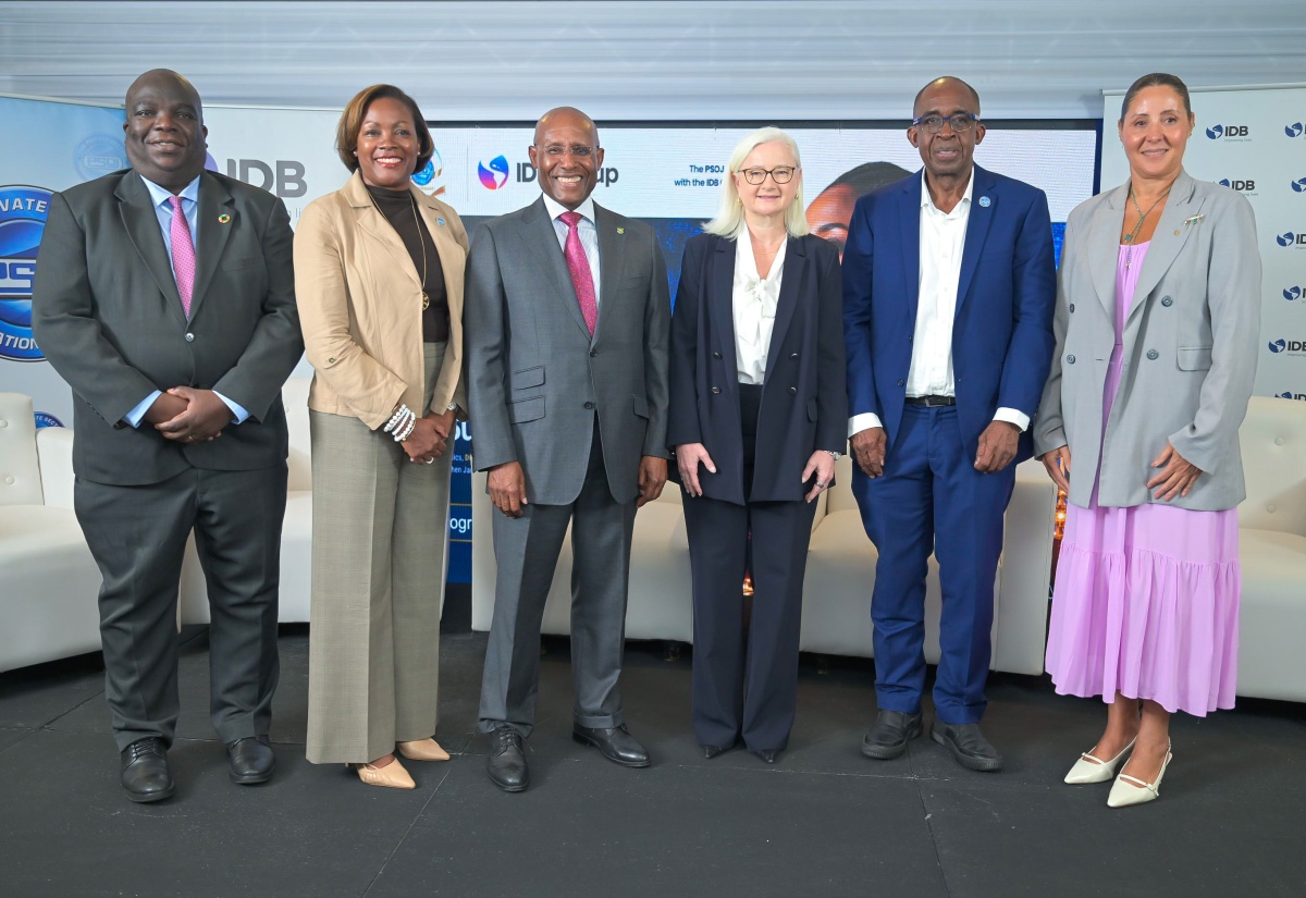 Minister of Industry, Investment and Commerce, Senator the Hon. Aubyn Hill, shares a photo opportunity with key stakeholders during the Private Sector Organisation of Jamaica (PSOJ)/Inter-American Development Bank (IDB) Empower JA Forum at The Jamaica Pegasus hotel in New Kingston on Monday (September 7). From left are United Nations (UN) Resident Coordinator in Jamaica, Dennis Zulu; PSOJ Executive Director, Sacha Vacciana-Riley; IDB Country Representative in Jamaica, Natacha Marzolf; PSOJ President, Patrick Hylton; and IDB Chief of Operations, Karisa Maia Ribeiro.
