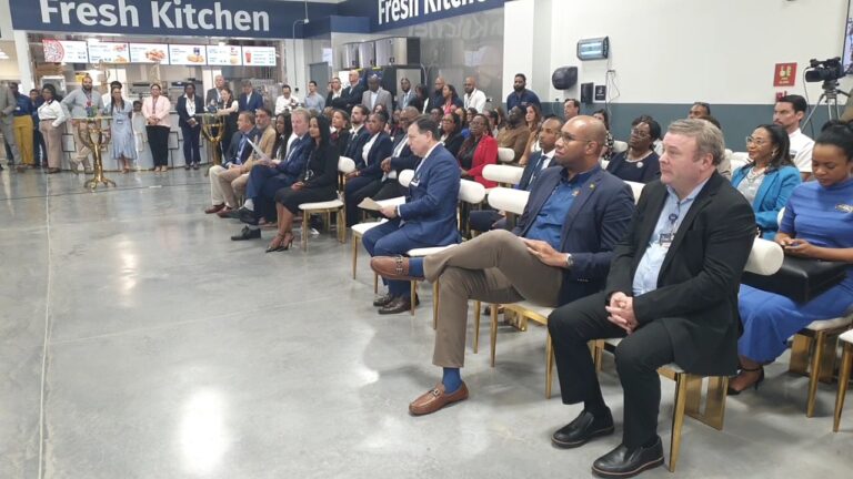 Minister of State in the Ministry of Industry, Investment and Commerce Delano Seiveright (second right) and other dignitaries in attendance during Wednesday’s ribbon cutting ceremony to officially open PriceSmart in Ironshore, St James.
